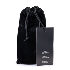 black velvet bag and card that reads Sui Generis, inspired by Pink Halloween Eau de Toilette 15 mL ℮ 0.5 fl oz.